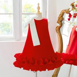   Rochita Cristina rosie cu funda mare alba pe umar croi lejer lungime medie