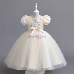 Rochie elegantă crem fetițe 3-12 ani Tania cu paiete și tulle" title="Rochie elegantă crem fetițe Tania 3-12 ani cu paiete, tulle și fundiță